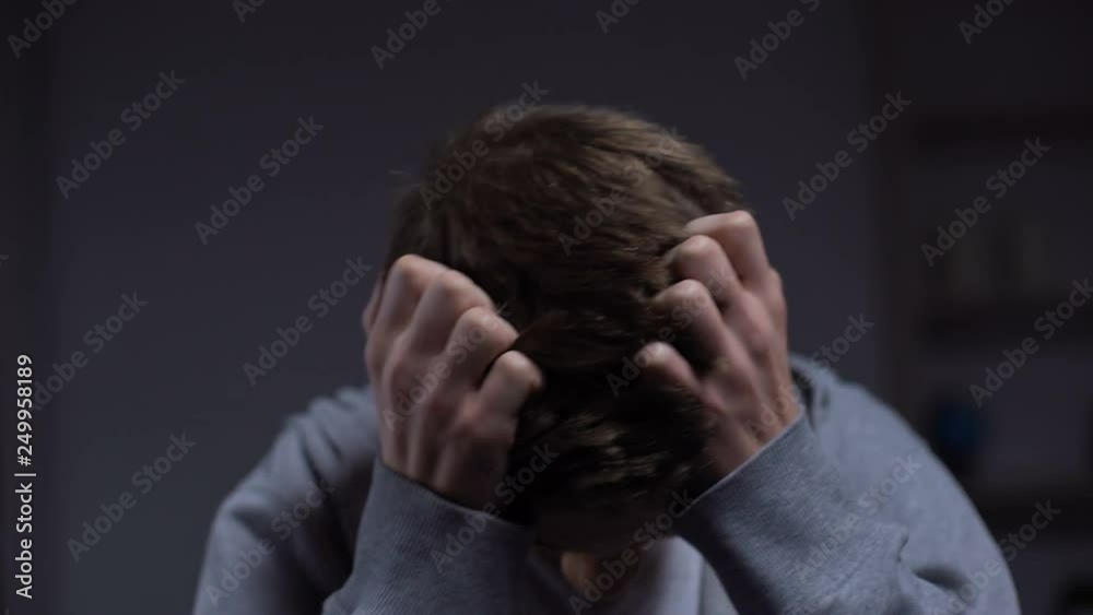 Teen criminal feeling guilty regretting about committing crime, juvenile justice Teen criminal feeling guilty regretting about committing crime, juvenile justice