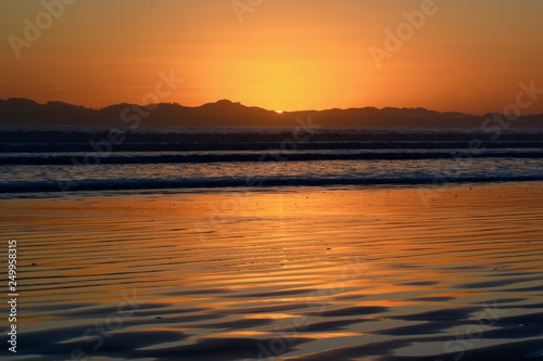 Dramatic sunrise colours  beautiful sunrise on a beach. 