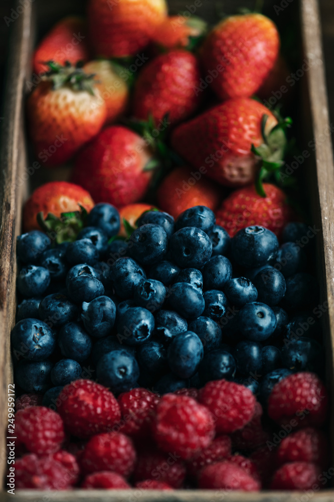 Fresh berries in a wooden box Fresh berries in a wooden box