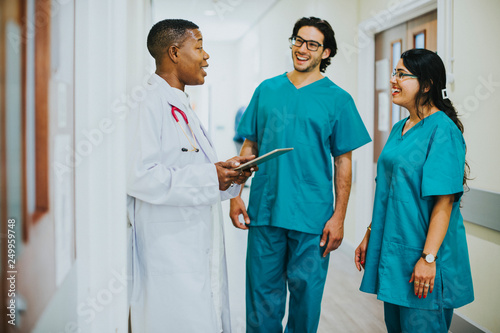 Medical team having a conversation in the hallway