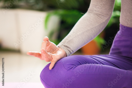 Close up hand of Yoga for meditation exercise in class 