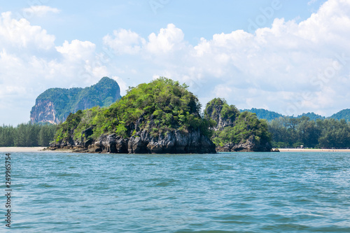 A Thai long tail boat on the beach of Andaman sea located at Krabi near Phuket, Thailand