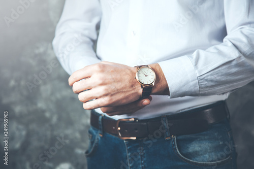 young business man hand watch