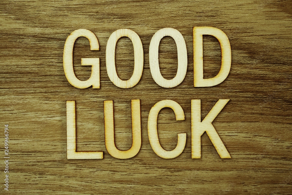 Good Luck text message on wooden background Good Luck text message on wooden background