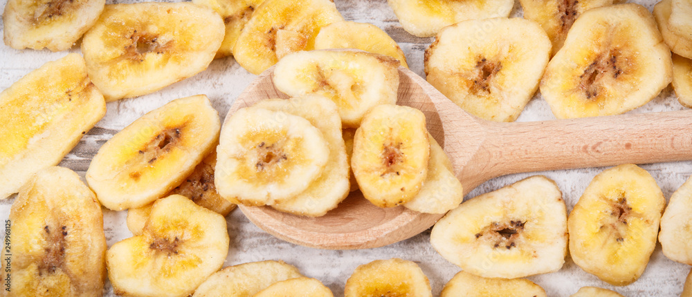 Homemade chips of banana for snack or dessert Homemade chips of banana for snack or dessert