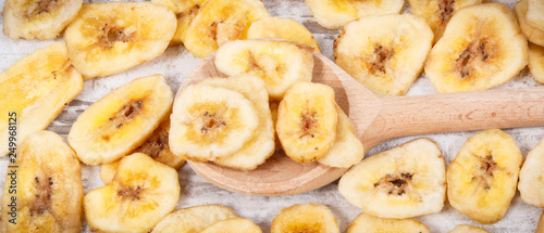 Homemade chips of banana for snack or dessert © ratmaner