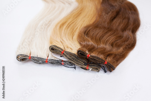 Natural hair for extensions in tapes. Different colors.