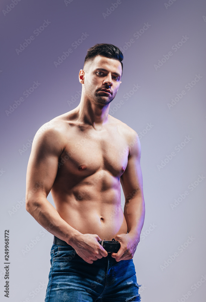 Obraz premium Portrait of a sexy muscular shirtless man posing