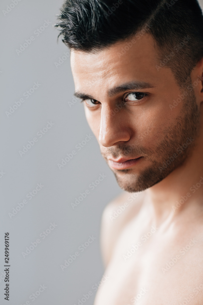 Fototapeta premium Close up portrait of handsome shirtless man