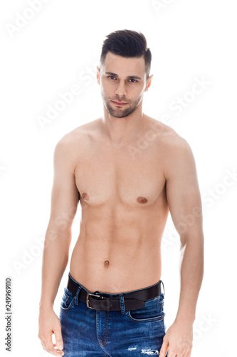Handsome muscular shirtless man posing on white background