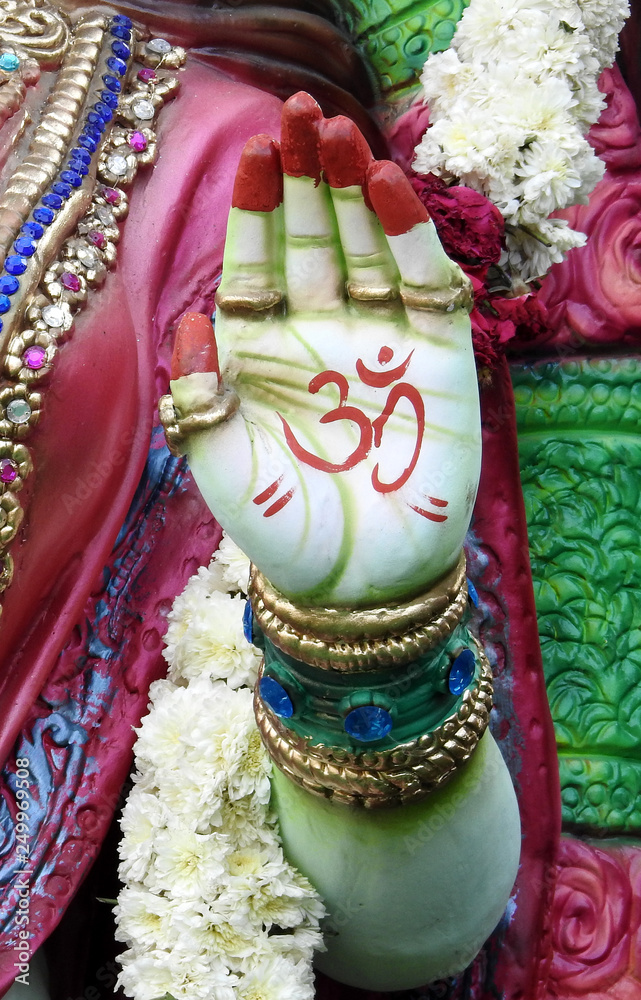  Closeup of Hand of Hindu goddess Lakshmi,in blessing pose,in a temple