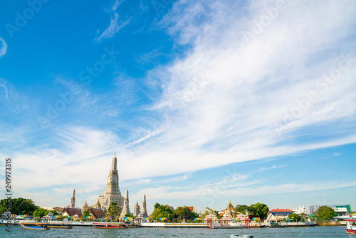 Photography Temple of dawn Wat Arun with boat blue sky sunny day