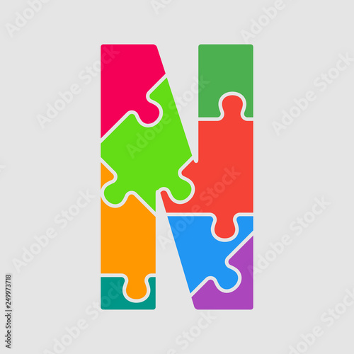 Color jigsaw font vector puzzle pieces letter M.