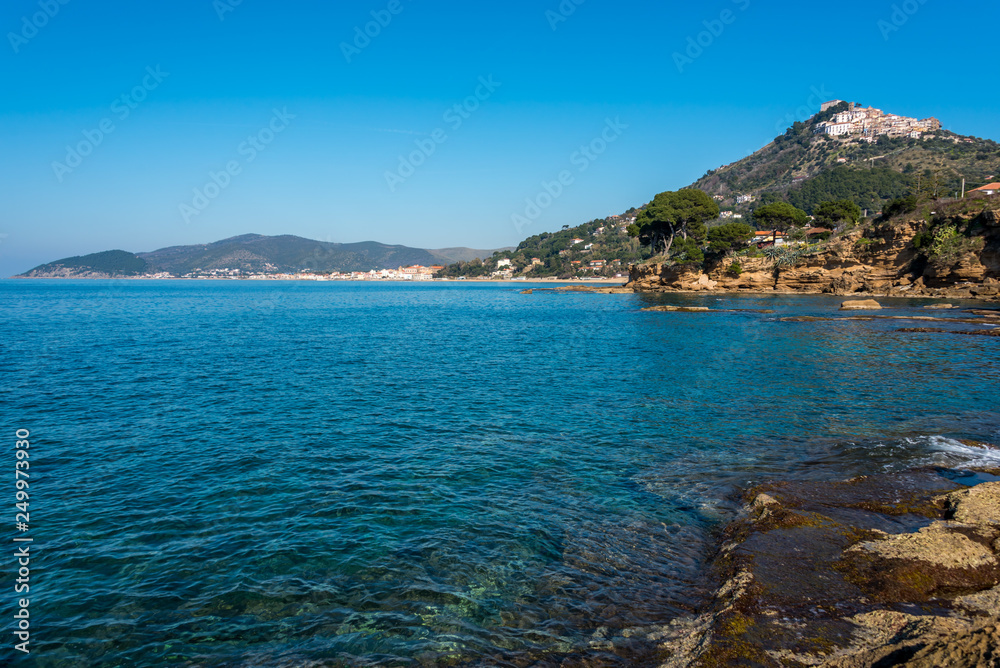 Obraz premium Blue Mediterranean Sea on the Rocky Southern Italian Coast on a Sunny Day