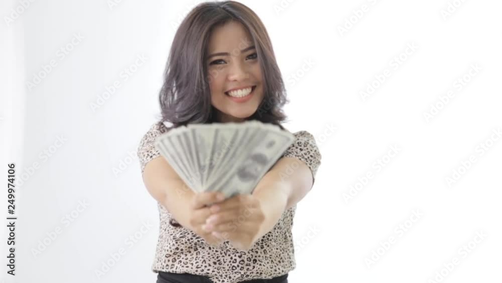 happy excited young asian business woman holding us dollar money happy excited young asian business woman holding us dollar money