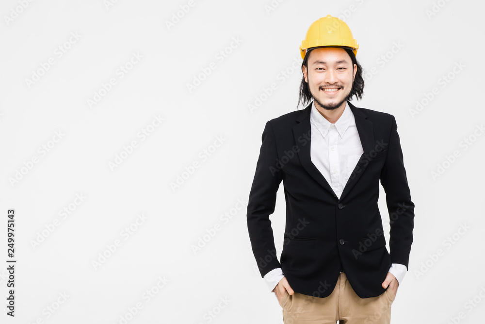 Portrait of engineer, yellow helmet on his head.. Portrait of engineer, yellow helmet on his head..