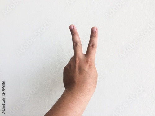 Wallpaper Mural hand showing number two sign isolated on white background Torontodigital.ca