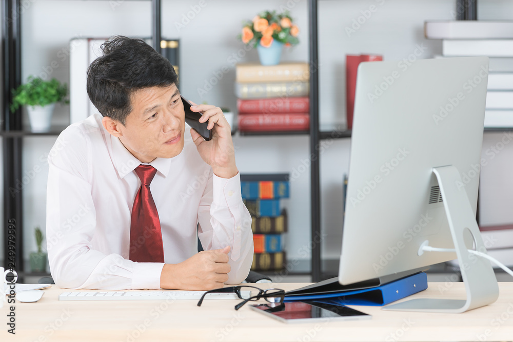 Fototapeta premium Asian business man at office