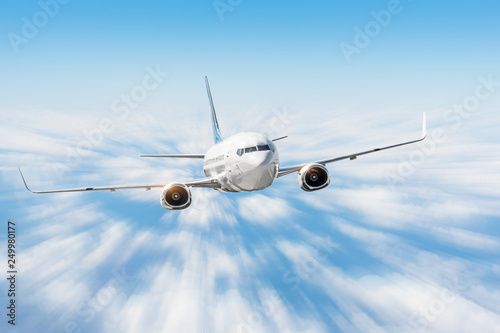 Traveling by airplane above the clouds, high speed motion blur effect