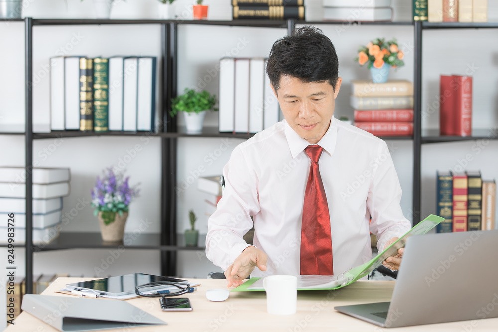 Fototapeta premium Asian business man at office
