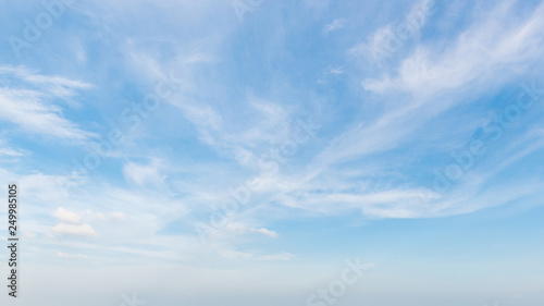 Beautiful clouds with blue sky background. Nature weather.cloud is water vapour in the atmosphere that has condensed into very small water droplets or ice crystals that appear in visible shapes photo