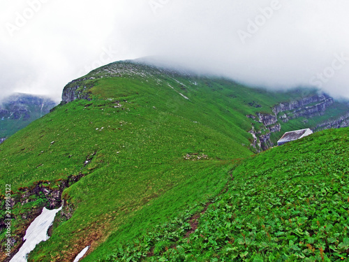 Alpine peak Hinderrugg in the Churfirsten mountain range, between the Toggenburg region and Lake Walensee - Canton of St. Gallen, Switzerland photo