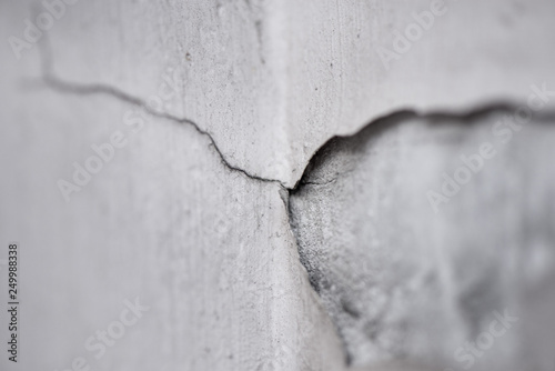 Abstract macro shot of a cracked marmor stone wall after earthquake