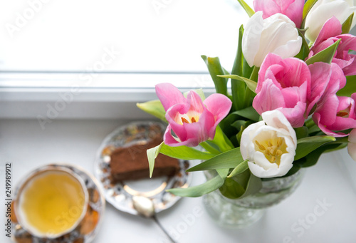 bouquet of tulips, pink and white tulips, a Cup of tea