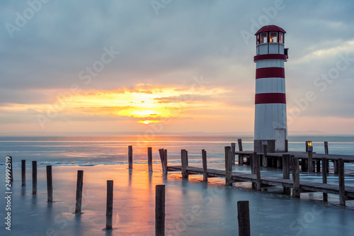 Lighthouse on the lake in winter