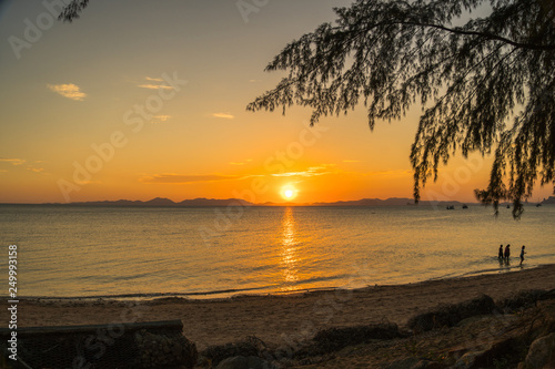 sunset at Kwang beach or deer beach there have a small island name Kwang island in the middle of Kwang beach in Krabi Thailand