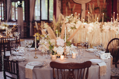 rustic wedding decorations with flowers and candles. banquet decor. picture with soft focus