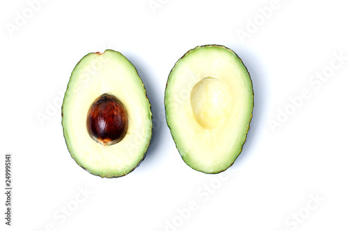 Fresh green avocado close-up, isolated on white background