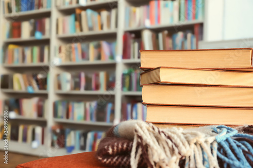 Stack of books on table in ...