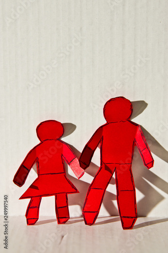 Red paper cutout couple abstract