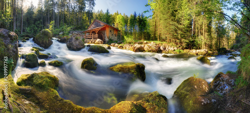 Fototapeta Naklejka Na Ścianę i Meble -  Austria landscape with waterfall and watermill near Salzburg, Golling Alps