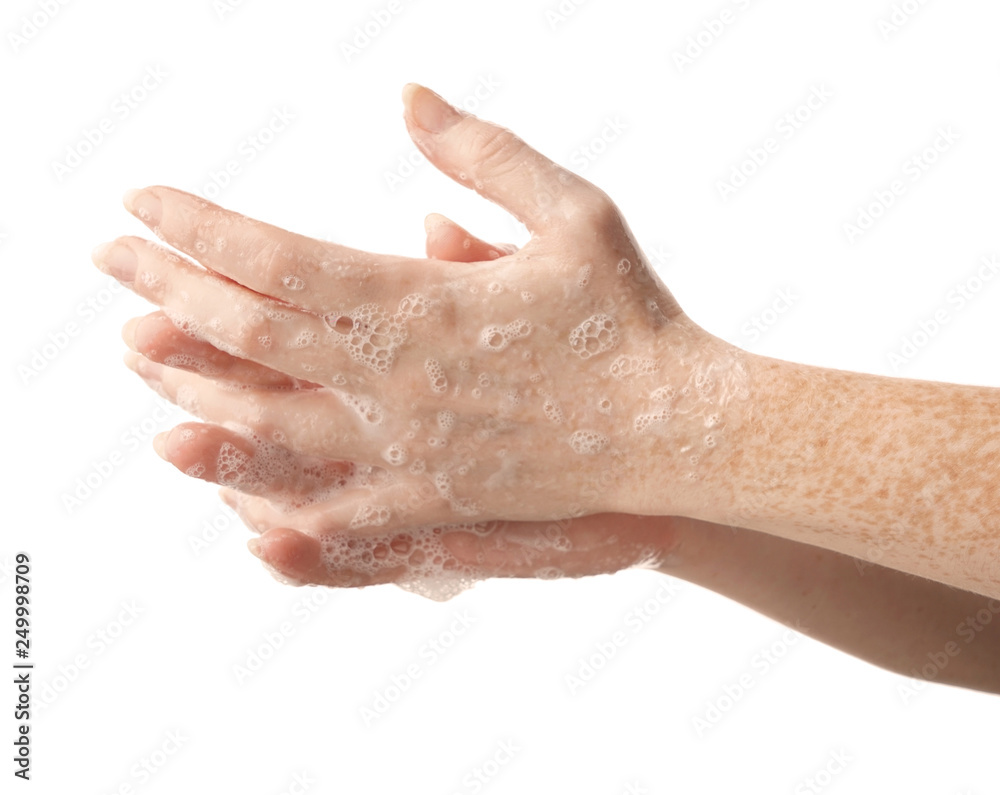 Woman washing hands on white background