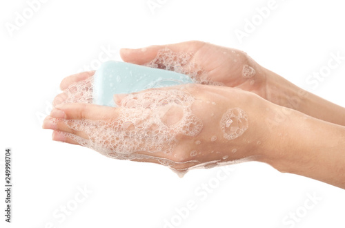 Woman washing hands on white background