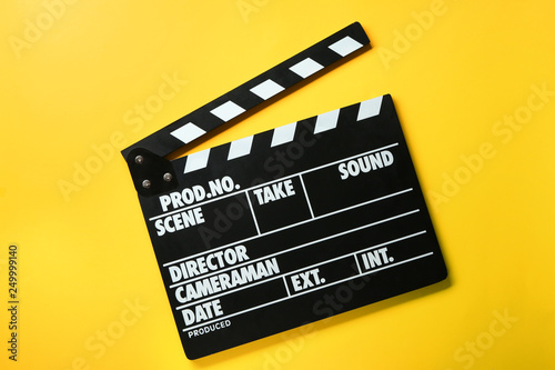 Obraz na płótnie Cinema clapperboard on color background