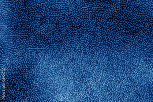 Navy blue toned weathered leather texture.