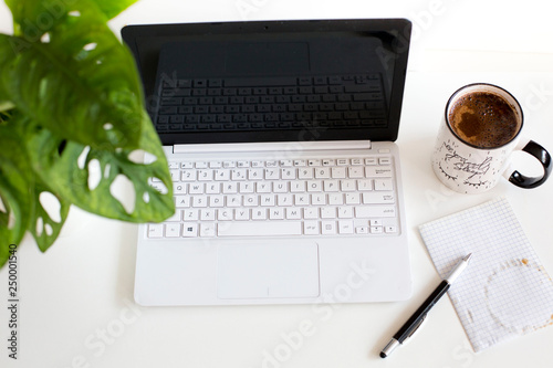 Laptop on table in office