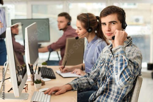 Technical support agents working in office