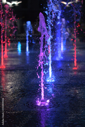 Fototapeta Naklejka Na Ścianę i Meble -  violet jet fountain