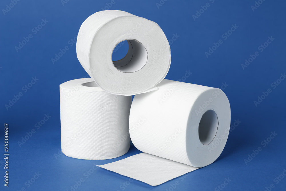 Rolls of toilet paper on color background Rolls of toilet paper on color background