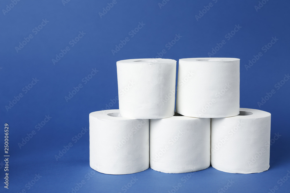 Rolls of toilet paper on color background Rolls of toilet paper on color background