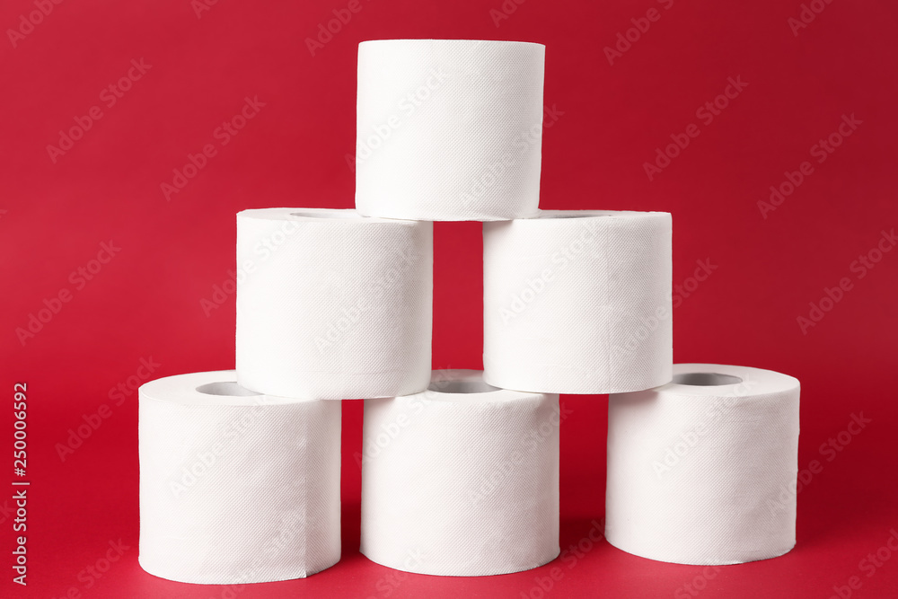 Rolls of toilet paper on color background Rolls of toilet paper on color background