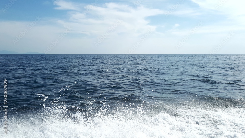 Image of water splash, sea and skies