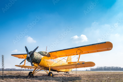 A big old yellow plane
