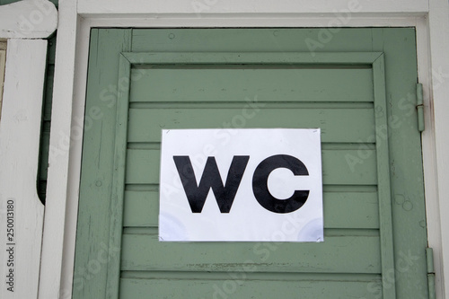 wc sign on door photo