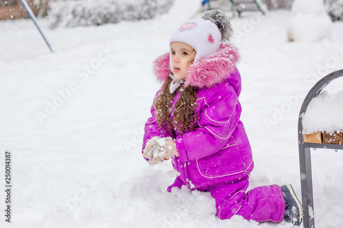 Little kid girl playing in ...