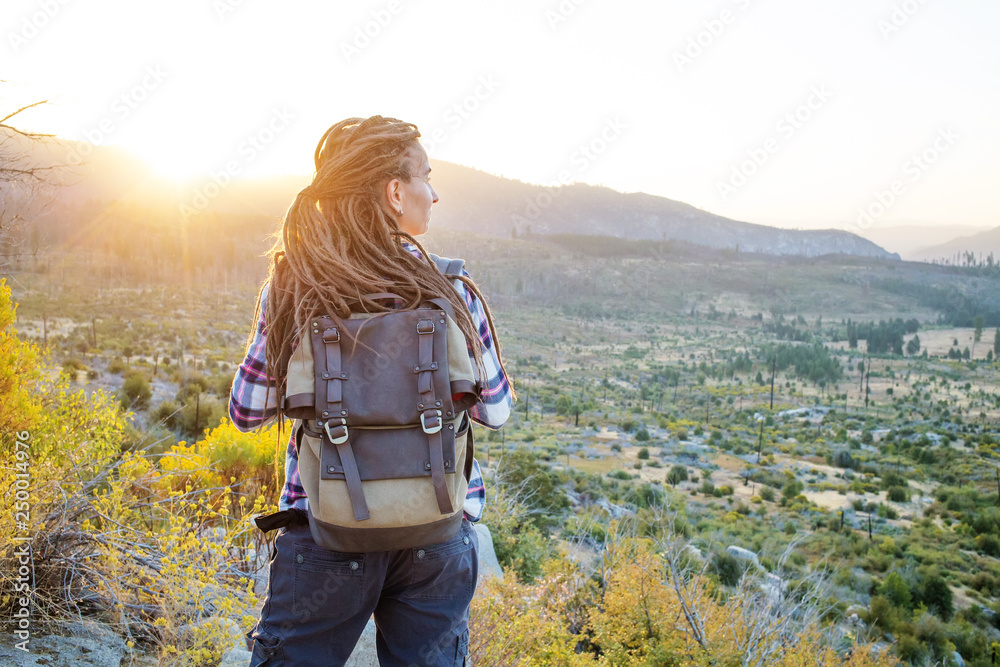 Hiker woman visit Yosemite national park in California Hiker woman visit Yosemite national park in California